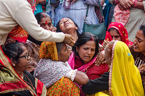 Family members of a victim, who died after consumption of allegedly contaminated water, mourn in Bhagirathpura area of Indore, Madhya Pradesh.