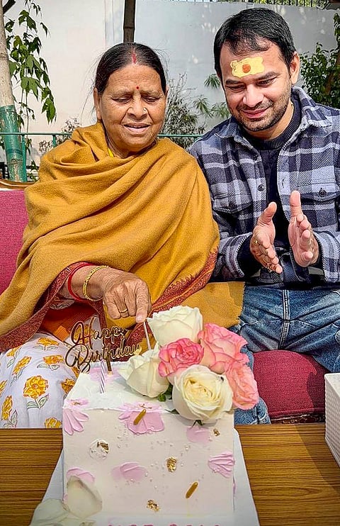 RJD leader Rabri Devi with elder son and Janshakti Janta Dal (JJD) chief Tej Pratap Yadav celebrates her 67th birthday, in Patna.