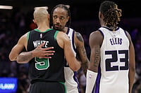 | Photo: AP/Scott Marshall : Boston Celtics guard Derrick White (9) and Sacramento Kings guard Demar Derozan, behind, hug before times runs out during the second half of an NBA basketball game in Sacramento, California. 