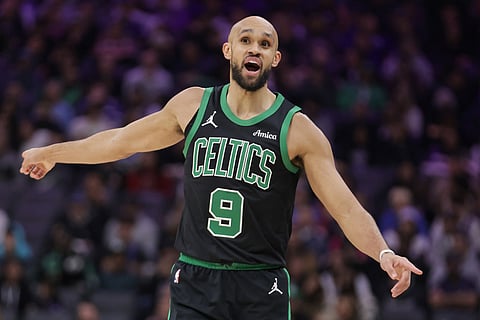 Boston Celtics guard Derrick White reacts after not getting a foul call against the Sacramento Kings during the first half of an NBA basketball game in Sacramento, California. 