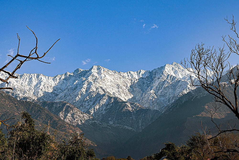| Photo: PTI : A view of the snow-capped Dhauladhar Range after fresh snowfall, as seen from Palampur, in Himachal Pradesh.