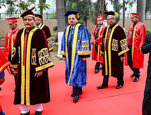 Chief Justice of India (CJI) Surya Kant, centre, Bihar Education Minister Sunil Kumar, front left, and Patna High Court acting Chief Justice Sudhir Singh, second right, during the annual convocation ceremony of Chanakya National Law University (CNLU), in Patna.
