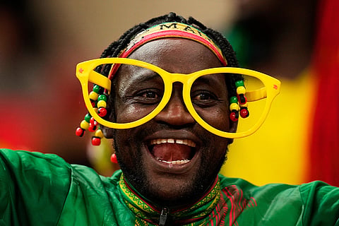 A Mali soccer fan waits for the start of the African Cup of Nations Group A soccer match between Morocco and Mali in Rabat, Friday, Dec. 26, 2025. 