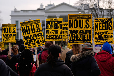 Protesters rally outside the White House in Washington, after the U.S. captured Venezuelan President Nicolás Maduro and his wife in a military operation.