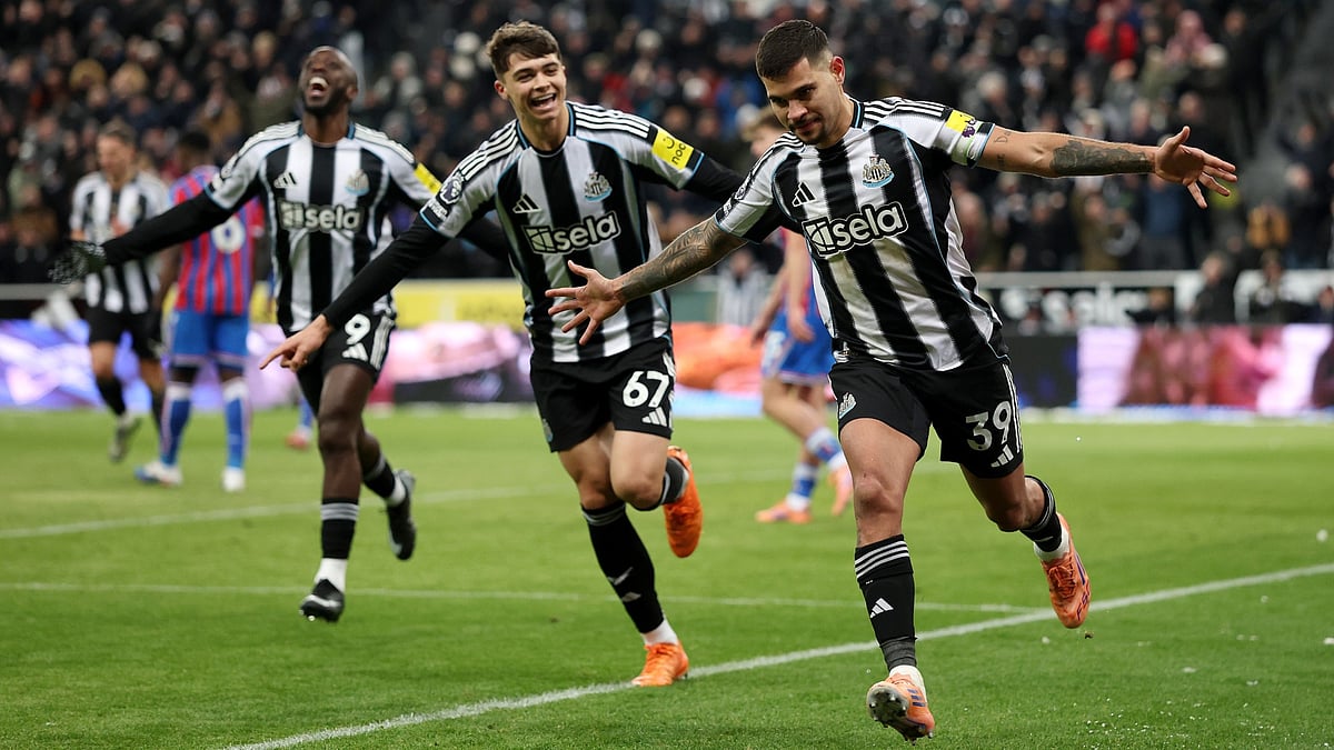 Bruno Guimaraes celebrates scoring.