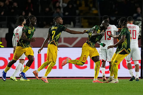 Mali players celebrate after a goal during the Africa Cup of Nations best of 16 soccer match between Mali and Tunisia in Casablanca, Morocco.