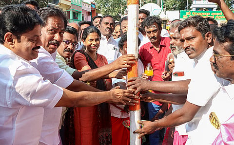 Tamil Nadu Minister for Commercial Taxes and Registration P. Moorthy takes part in the ‘Pandakkal’ laying ceremony for the Avaniyapuram Jallikattu, in Madurai.