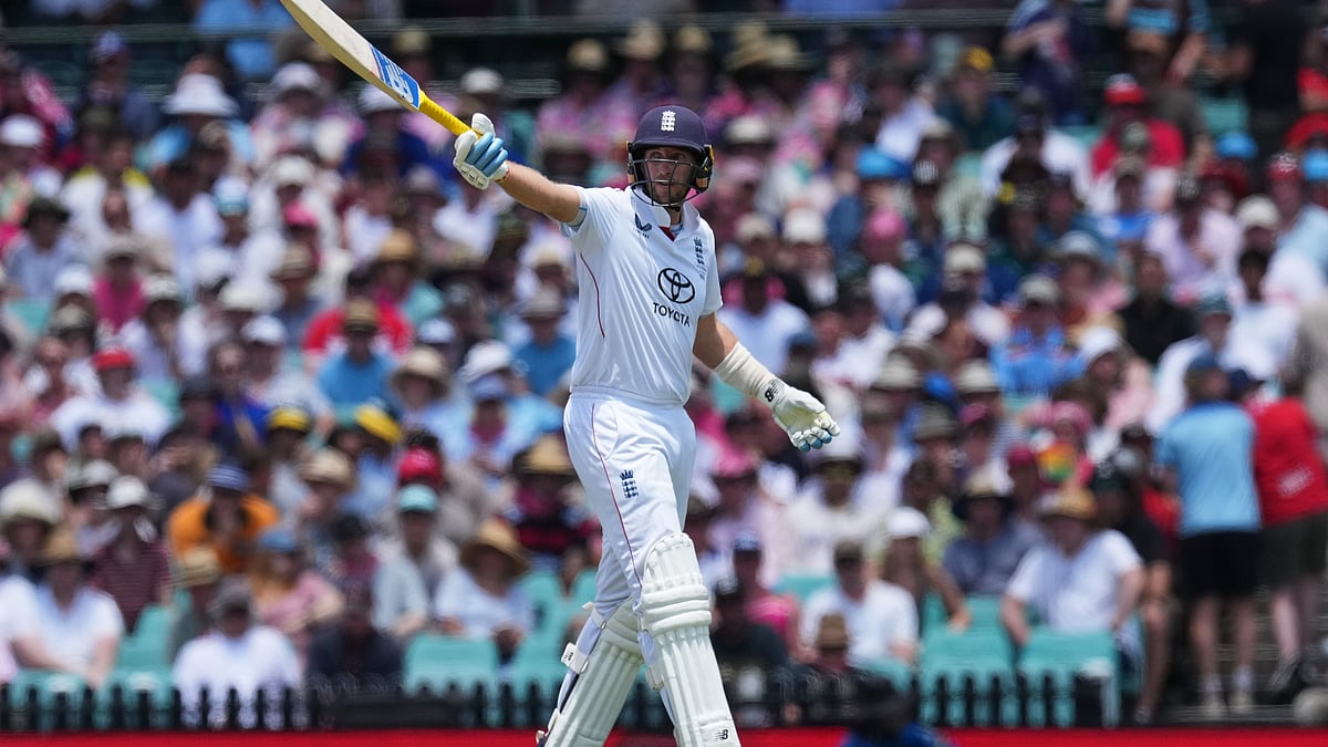 | Photo: AP/Mark Baker : England's Joe Root gestures with his bat during play on day two of the fifth and final Ashes cricket test between England and Australia in Sydney, Monday, Jan. 5, 2026. 