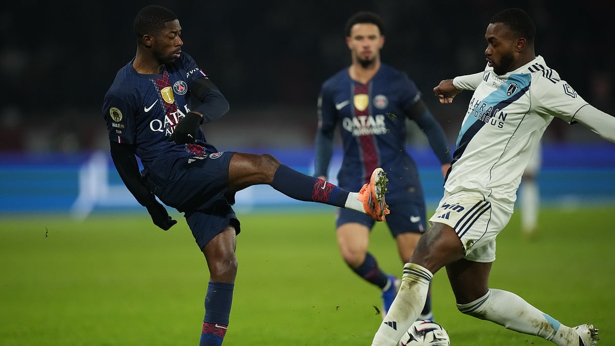 | Photo: AP/Christophe Ena : PSG's Ousmane Dembele, left, and Paris FC's Otavio fight for the ball during the French Ligue 1 soccer match between Paris Saint-Germain and Paris FC in Paris, Sunday, Jan. 4, 2026. 