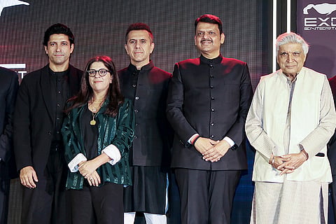 Maharashtra Chief Minister Devendra Fadnavis, Excel Entertainment founders Ritesh Sidhwani, Farhan Akhtar, lyricist Javed Akhtar, and others during a press conference regarding the partnership deal announcement between Universal Music Group and Excel Entertainment, in Mumbai.