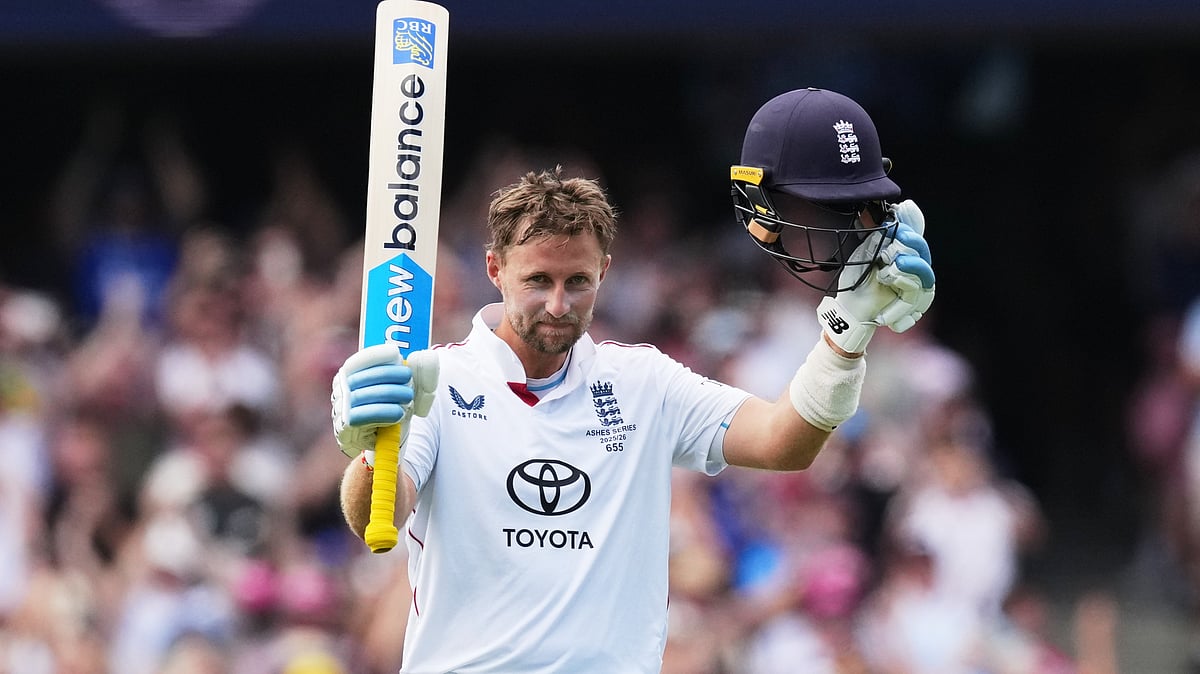 | Photo: AP/Mark Baker : England's Joe Root celebrates after scoring a century during play on day two of the fifth and final Ashes cricket test between England and Australia in Sydney, Monday, Jan. 5, 2026. 