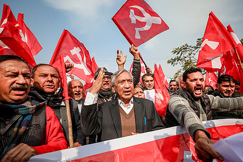 CPI (M) leader Mohamad Yousuf Tarigami, centre, and others hold a protest against the US military operation in Venezuela, in Jammu.