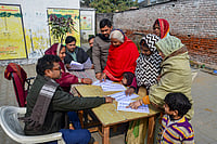 PTI; Representative image : People search for their names in the draft voter list after the Special Intensive Revision of electoral rolls in Uttar Pradesh, in Mirzapur, Uttar Pradesh.