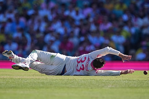 Australia's Marnus Labuschagne dives to field the ball during play on day four of the fifth and final Ashes cricket test between England and Australia in Sydney.