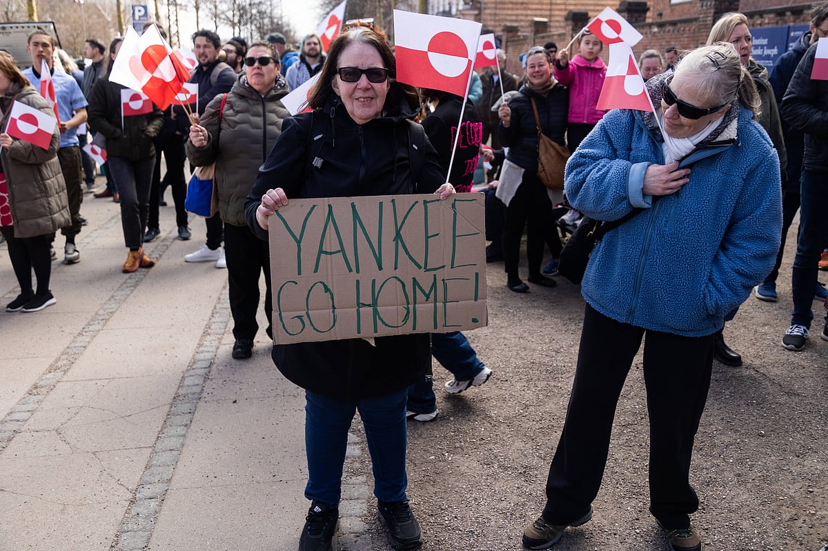 A protester carries a placard that says YANKEE GO HOME! during a demonstration against the U.S. (Trump administration's) statements about wanting power over Kalaallit Nunaat Greenland, held in front of the American embassy. Copenhagen Denmark, April 6, 2025 - IMAGO/Zuma Wire