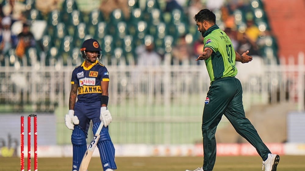 | Photo: AP/Anjum Naveed : Pakistan's Haris Rauf, right, celebrates after the dismissal of Sri Lanka's Pathum Nissanka during the third one day international cricket match between Pakistan and Sri Lanka, in Rawalpindi, Pakistan.