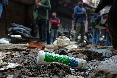 A tear gas shell lies on the ground after violence erupted during an anti-encroachment drive near the Syed Faiz Elahi Mosque, in New Delhi.
