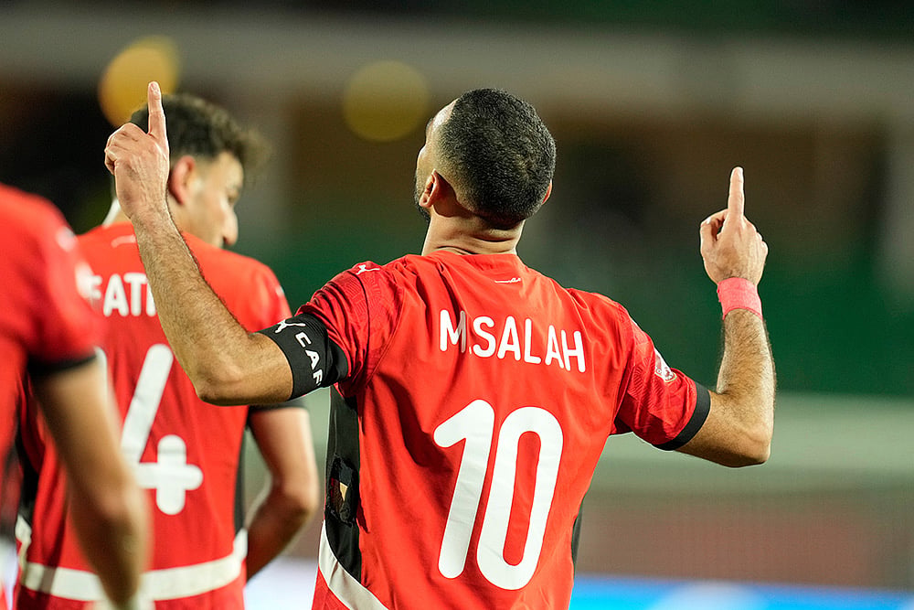 | Photo: AP/Mosa'ab Elshamy : Egypt's Mohamed Salah celebrates after scoring his side's third goal during the Africa Cup of Nations round of 16 soccer match between Egypt and Benin in Agadir, Morocco.
