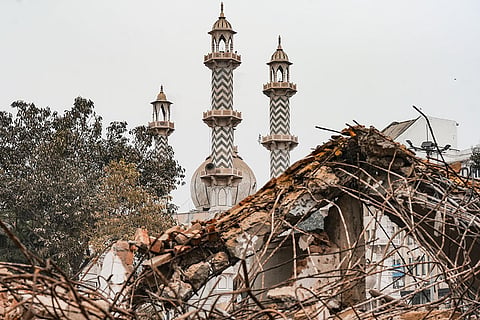 A damaged structure after the demolition of alleged encroachments on a land adjoining the Syed Faiz Elahi Mosque and a nearby graveyard, carried out by the Municipal Corporation of Delhi (MCD), in New Delhi. 
