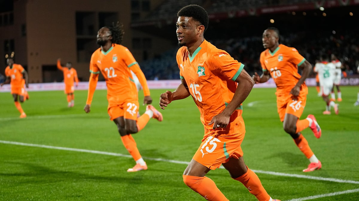 (AP Photo/Themba Hadebe) : Ivory Coast's Amad Diallo celebrates after scoring his sides first goal during the Africa Cup of Nations best of 16 soccer match between Ivory Coast and Burkina Faso in Marrakech, Morocco, Tuesday, Jan. 6, 2026. 