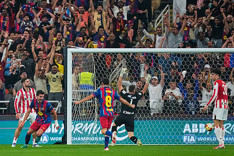 Barcelona's Ferran Torres, second left, celebrates after scoring the opening goal during the Spanish Super Cup semifinal soccer match against Athletic Club Bilbao at King Abdullah Sports City Stadium in Jeddah, Saudi Arabia.