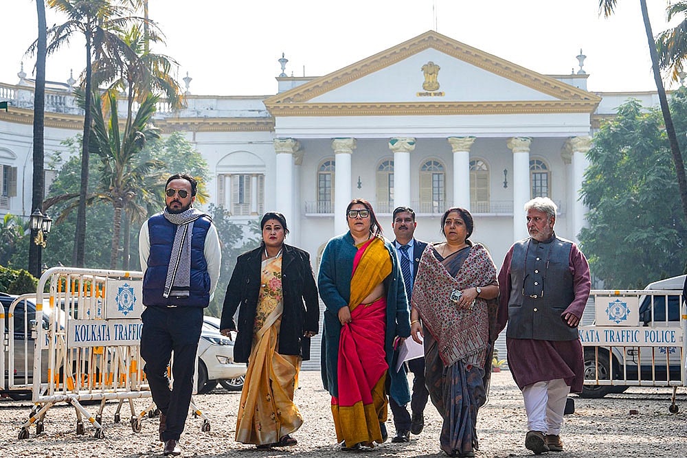 | Photo: PTI/Manvender Vashist Lav : From left, BJP leaders Indranil Khan, Phalguni Patra, Locket Chatterjee, Shashi Agnihotri and Shishir Bajoria leave after a meeting of the party's delegation with West Bengal Governor CV Ananda Bose, in Kolkata.
