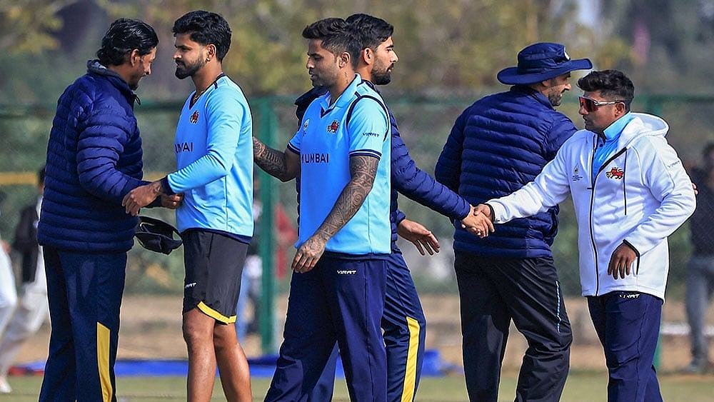 Photo: PTI : Mumbai's Shreyas Iyer, Suryakumar Yadav and Sarfaraz Khan exchange greetings with Punjab players after the former team won the Vijay Hazare Trophy 2025-26 cricket match against Punjab, at Jaipuria Vidyalaya Ground, in Jaipur.