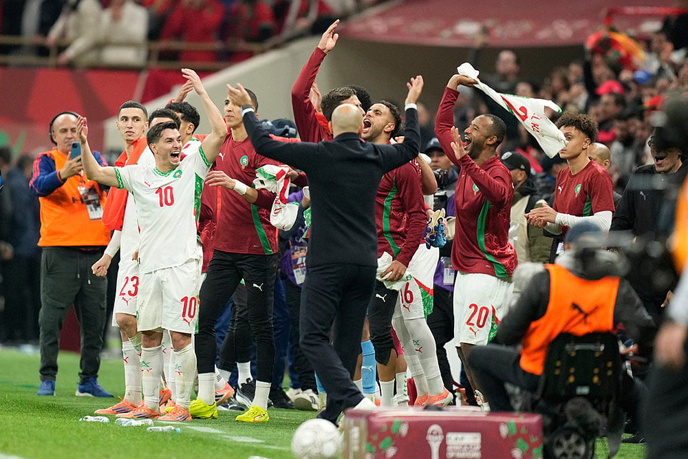 | Photo: AP/Mosa'ab Elshamy : Morocco players celebrate after the Africa Cup of Nations quarterfinal soccer match between Cameroon and Morocco, in Rabat, Morocco.
