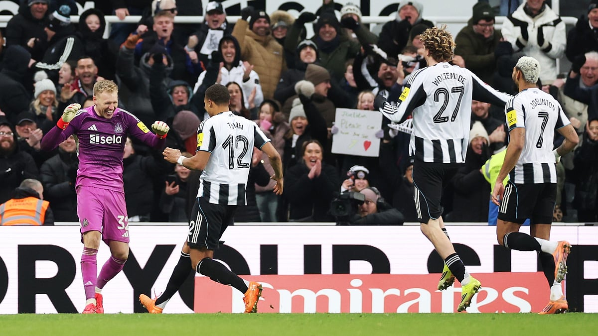 Aaron Ramsdale celebrates his penalty shoot-out heroics with his Newcastle team-mates
