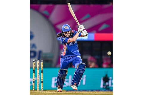 Mumbai Indians’ Amelia Kerr plays a shot during a Women's Premier League (WPL) T20 cricket match between Mumbai Indians and Royal Challengers Bengaluru, at the DY Patil Stadium, in Navi Mumbai.