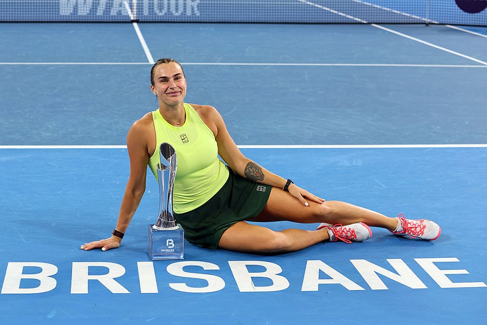| Photo: AP/Tertius Pickard : Aryna Sabalenka of Belarus poses with the winners trophy after winning the women's final match against Marta Kostyuk of Ukraine 6-4, 6-3, at the Brisbane International tennis tournament in Brisbane, Australia.