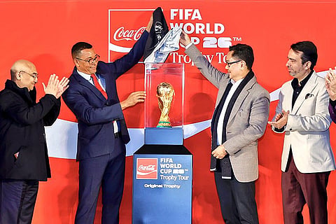In this image posted on Jan. 11, 2026, Union Minister Kiren Rijiju attends the FIFA World Cup trophy tour by Coca-Cola, in New Delhi. 