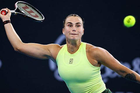 Aryna Sabalenka of Belarus plays a shot during the women's final match against Marta Kostyuk of Ukraine at the Brisbane International tennis tournament in Brisbane, Australia.