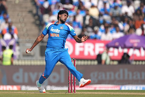 India's Harshit Rana bowls a delivery during the first One Day International cricket match between India and New Zealand in Vadodara, India.