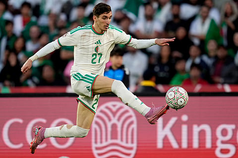 Algeria's Adil Boulbina controls the ball during the Africa Cup of Nations quarterfinal soccer match between Nigeria and Algeria, in Marrakech, Morocco.