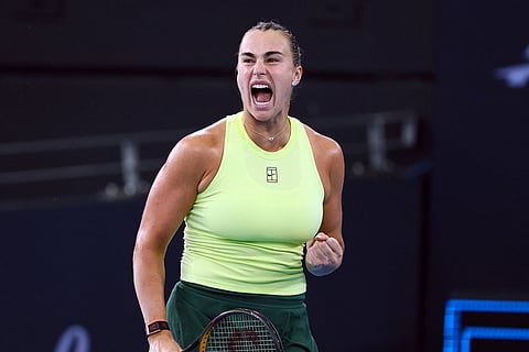 Aryna Sabalenka of Belarus reacts after winning a point during the women's final match against Marta Kostyuk of Ukraine at the Brisbane International tennis tournament in Brisbane, Australia.