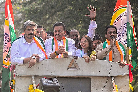 NCP (Sharad Pawar) State President Shashikant Shinde, second left, and party MLA Rohit Pawar, left, during a political rally for Navi Mumbai Municipal Corporation elections in Sanpada, in Navi Mumbai.