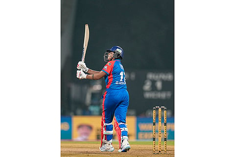 Delhi Capitals' Shafali Verma plays a shot during a Women's Premier League (WPL) T20 cricket match between Gujarat Giants and Delhi Capitals, at the DY Patil Stadium, in Navi Mumbai.