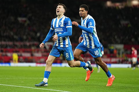 Brighton's Brajan Gruda, left, an Georginio Rutter celebrate after a goal during the FA Cup third round soccer match between Manchester United and Brighton in Manchester, England.