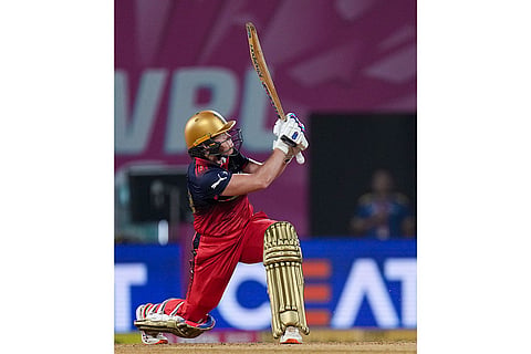 Royal Challengers Bengaluru's Grace Harris plays a shot during a Women's Premier League (WPL) T20 cricket match between Royal Challengers Bengaluru and UP Warriorz, at the DY Patil Stadium in Navi Mumbai.