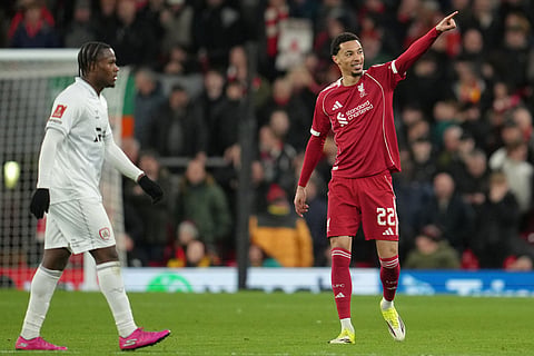 Liverpool's Hugo Ekitike reacts after scoring during the FA Cup third round soccer match between Liverpool and Barnsley in Liverpool, England.