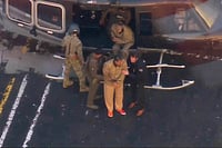 AP : This image taken video shows Venezuelan President Nicolas Maduro getting off a helicopter on his way to Manhattan Federal Court, Monday, Jan. 5, 2026, in New York.
