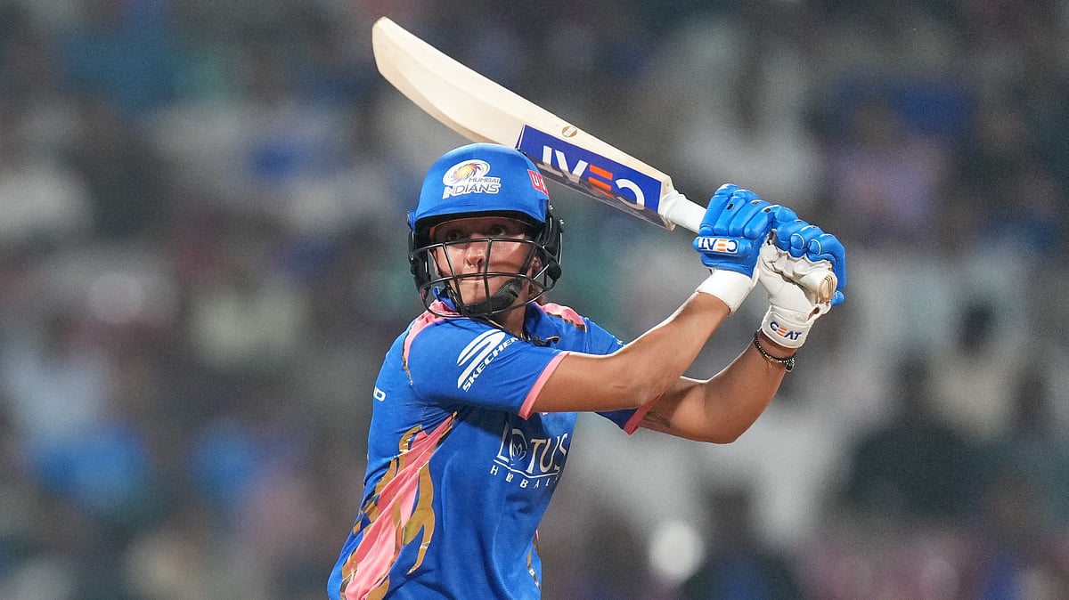 PTI : Mumbai Indians' captain Harmanpreet Kaur plays a shot during their Women's Premier League match against Gujarat Giants at the DY Patil Stadium in Navi Mumbai.