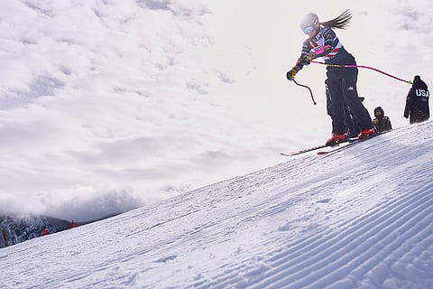 Skier Bella Wright, 28, of Salt Lake City, heads down the hill for a practice run with members of the U.S. Women's Ski Team at Copper Mountain, Colo.