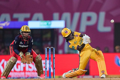 UP Warriorz's Deandra Dottin ducks a delivery during a Women's Premier League (WPL) T20 cricket match between Royal Challengers Bengaluru and UP Warriorz, at the DY Patil Stadium in Navi Mumbai.