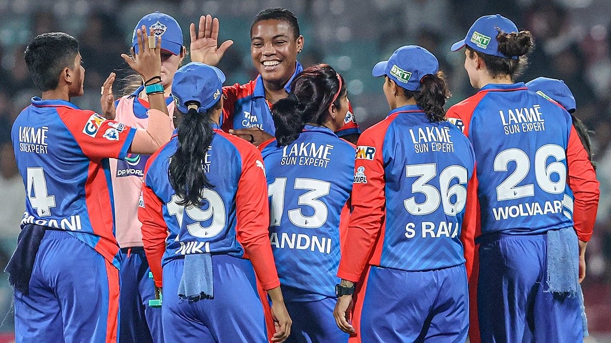 X/ DelhiCapitals : Delhi Capitals team celebrating during WPL 2026 match against UP Warriorz 
