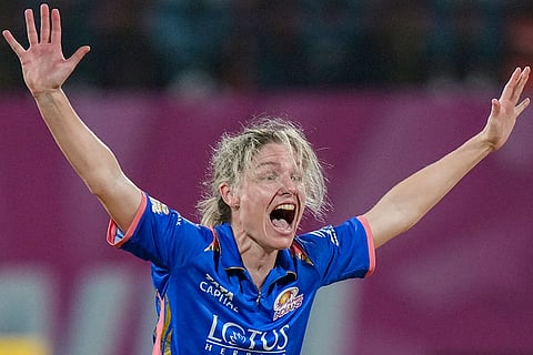 Mumbai Indians' Nicola Carey appeals for the wicket of Gujarat Giants' Ashleigh Gardner during the Women's Premier League (WPL) 2026 T20 cricket match between Gujarat Giants and Mumbai Indians, at the DY Patil Stadium, in Navi Mumbai.
