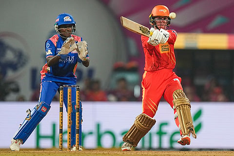 Gujarat Giants' Georgia Wareham plays a shot during the Women's Premier League (WPL) 2026 T20 cricket match between Gujarat Giants and Mumbai Indians, at the DY Patil Stadium, in Navi Mumbai.
