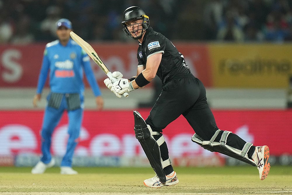 New Zealands Will Young plays a shot