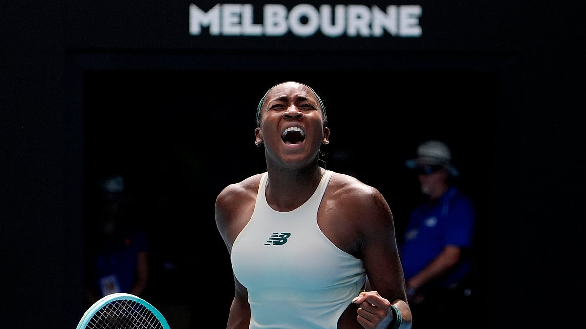 AP Photo/Asanka Brendon Ratnayake : Coco Gauff of the U.S. celebrates after defeating Belinda Bencic of Switzerland in a fourth round match at the Australian Open tennis championship in Melbourne, Australia, Sunday, Jan. 19, 2025.